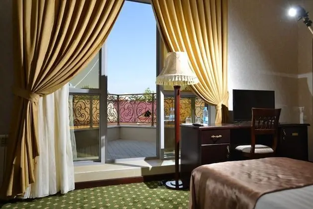 Deluxe Tek Büyük veya İki Ayrı Yataklı Oda