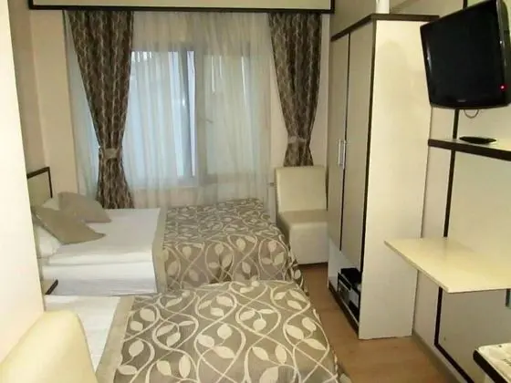 Üç Kişilik Oda
