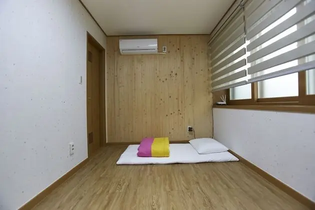 Korean Style Quad Room with Private Shower Booth and Toilet (Free Korean Style Breakfast)