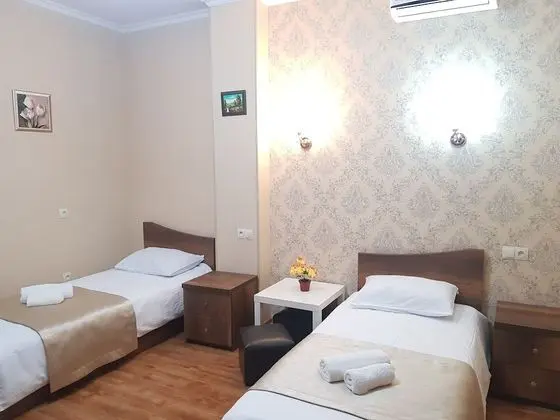 Deluxe Tek Büyük veya İki Ayrı Yataklı Oda