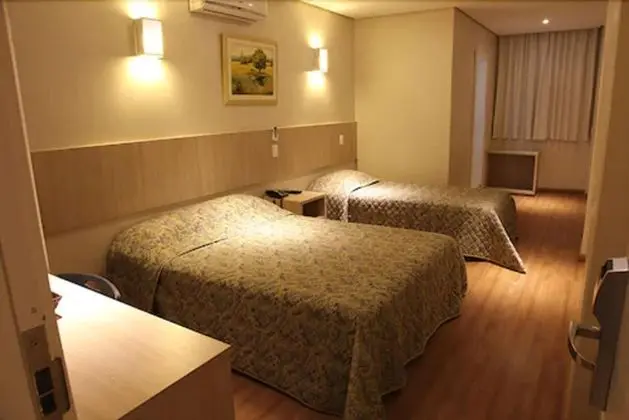 Quarto Duplo