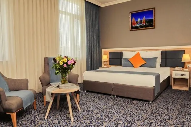 Deluxe Tek Büyük veya İki Ayrı Yataklı Oda