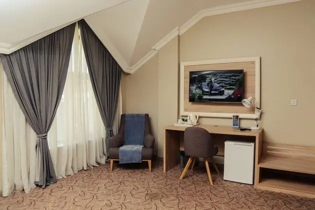 Deluxe Tek Büyük veya İki Ayrı Yataklı Oda