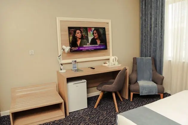 Deluxe Tek Büyük veya İki Ayrı Yataklı Oda