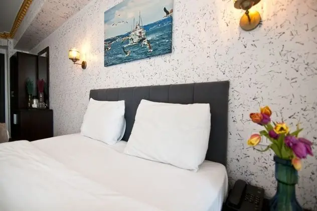 Deluxe Üç Kişilik Oda - Deniz Manzaralı