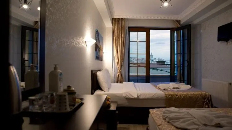 Deluxe Üç Kişilik Oda - Deniz Manzaralı