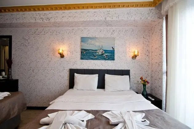 Deluxe Üç Kişilik Oda - Deniz Manzaralı