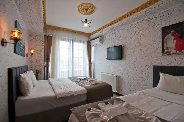 Deluxe Üç Kişilik Oda - Deniz Manzaralı