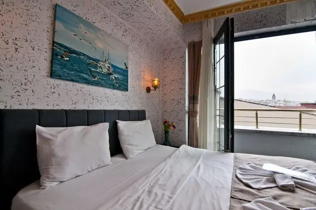 Deluxe Üç Kişilik Oda - Deniz Manzaralı