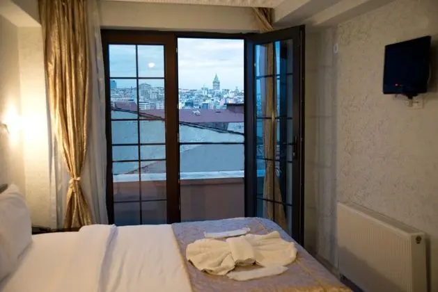 Deluxe Üç Kişilik Oda - Deniz Manzaralı
