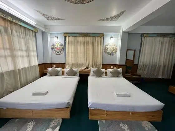 Deluxe Tek Büyük veya İki Ayrı Yataklı Oda