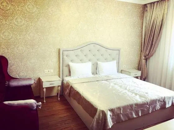 Deluxe Tek Büyük veya İki Ayrı Yataklı Oda