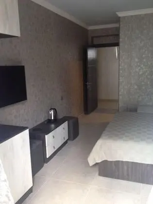 Luxury Tek Büyük Yataklı Oda, 1 Büyük (Queen) Boy Yatak ve Çekyat, Balkon, Kısmi Deniz Manzaralı
