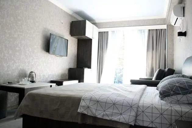 Luxury Üç Kişilik Oda, 1 Büyük (Queen) Boy Yatak ve Çekyat, Balkon, Kısmi Deniz Manzaralı