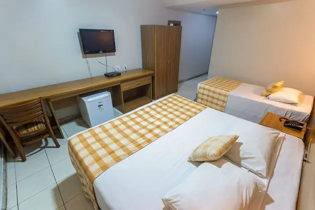 Quarto Triplo Casal