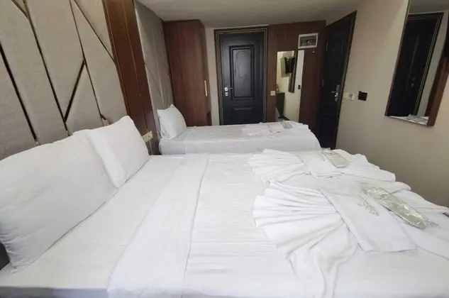 Üç Kişilik Oda