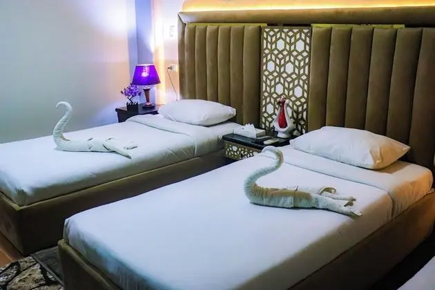 Deluxe Tek Büyük veya İki Ayrı Yataklı Oda