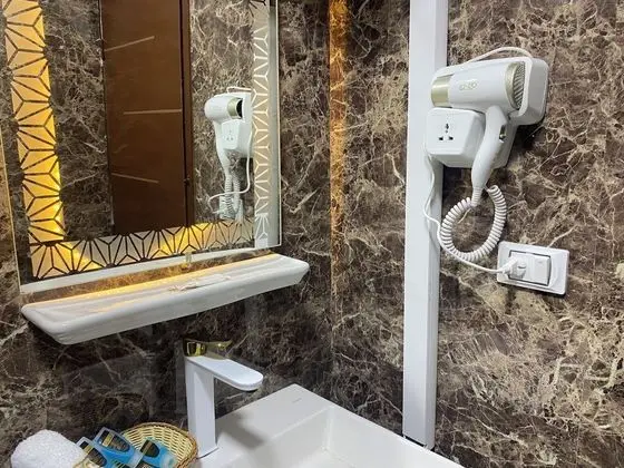 Deluxe Tek Büyük veya İki Ayrı Yataklı Oda