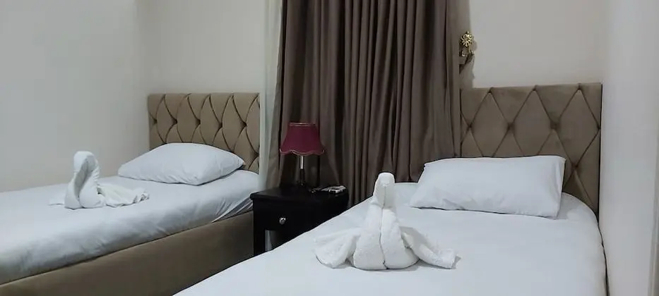 Deluxe Tek Büyük veya İki Ayrı Yataklı Oda