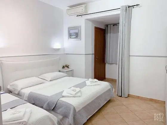 Deluxe Üç Kişilik Oda, Banyolu/Duşlu
