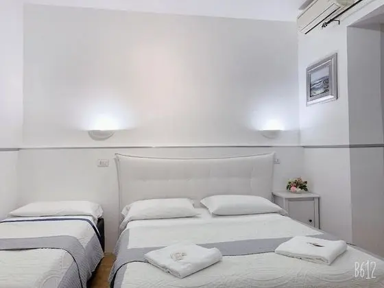 Deluxe Üç Kişilik Oda, Banyolu/Duşlu