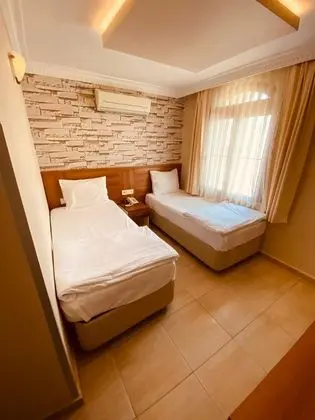 Her odamızda Klima, Tv, minibar saç kurutma makinası ve özel kasa mevcuttur