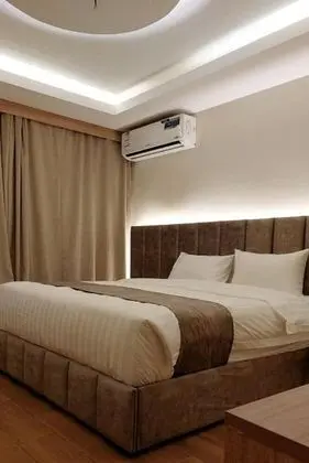 Deluxe Tek Büyük veya İki Ayrı Yataklı Oda
