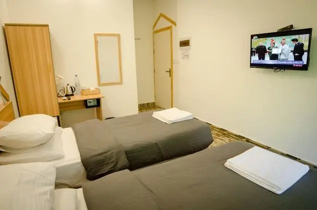 Deluxe Tek Büyük veya İki Ayrı Yataklı Oda