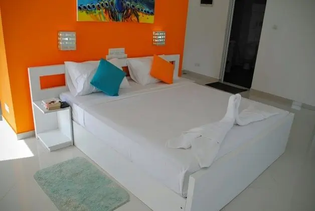 Deluxe Üç Kişilik Oda, Bahçe Manzaralı, Köşe