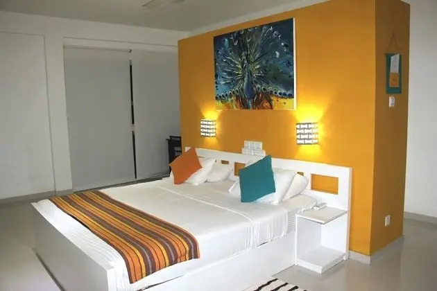 Deluxe Üç Kişilik Oda, Bahçe Manzaralı, Köşe