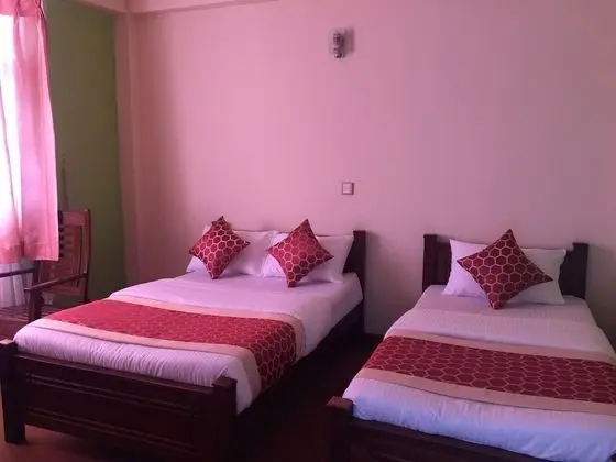 Deluxe Triple Room with Private Bathroom