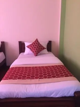 Deluxe Triple Room with Private Bathroom