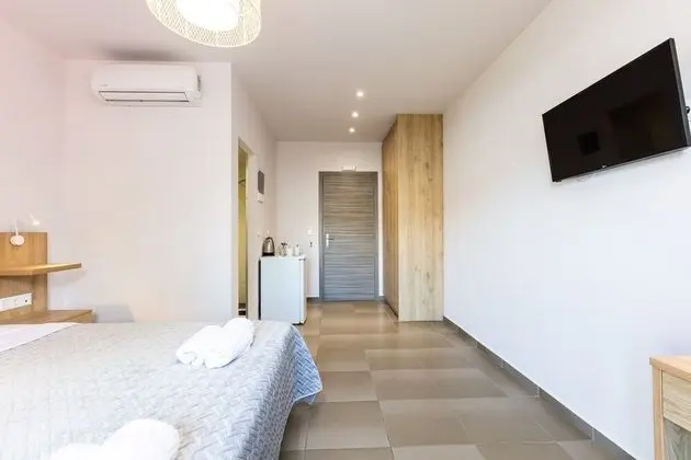 Quadruple Room with Side Sea View