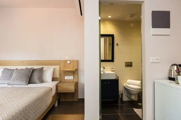 Quadruple Room with Side Sea View