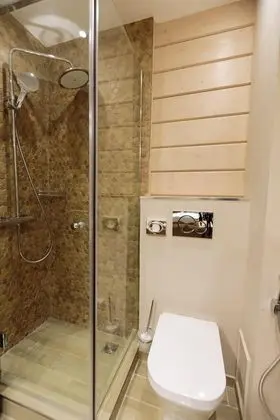 Tek Büyük veya İki Ayrı Yataklı Oda, Bahçe Manzaralı