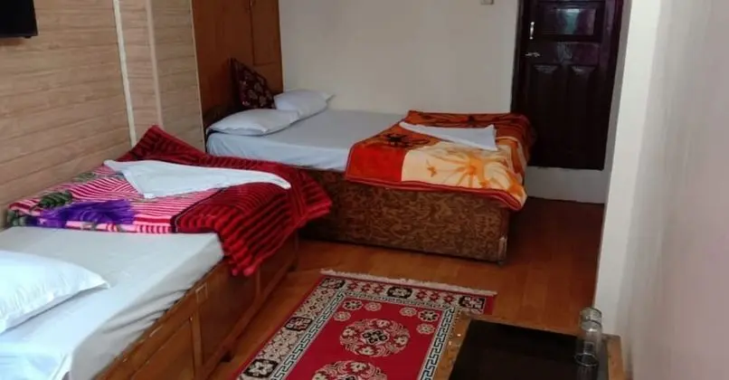 Deluxe Üç Kişilik Oda