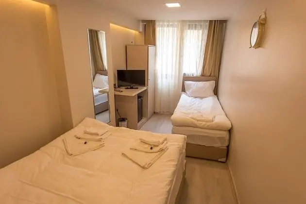 Economy Üç Kişilik Oda