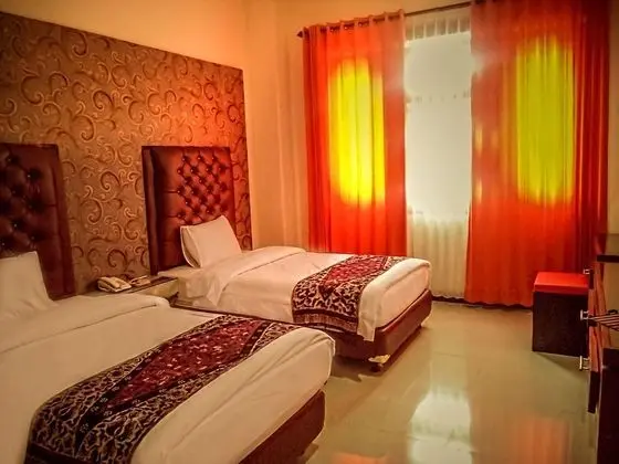 Deluxe Tek Büyük veya İki Ayrı Yataklı Oda