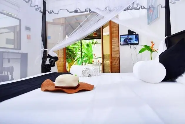 Deluxe Üç Kişilik Oda, Birden Çok Yatak, Engellilere Uygun, Bahçe Manzaralı