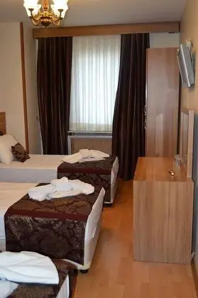 Üç Kişilik Oda