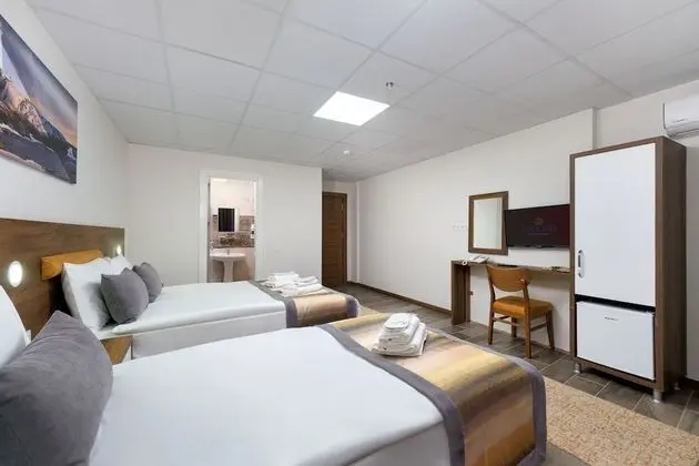 Deluxe Tek Büyük veya İki Ayrı Yataklı Oda