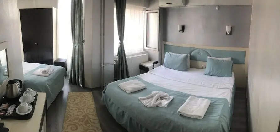 Üç Kişilik Oda