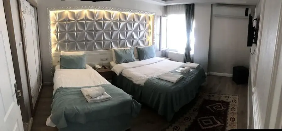 Üç Kişilik Oda