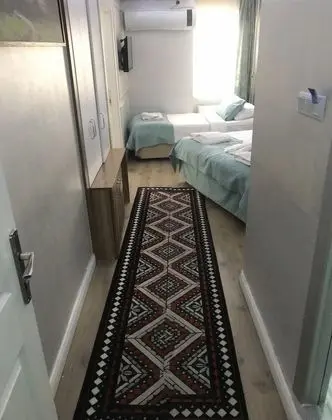 Üç Kişilik Oda
