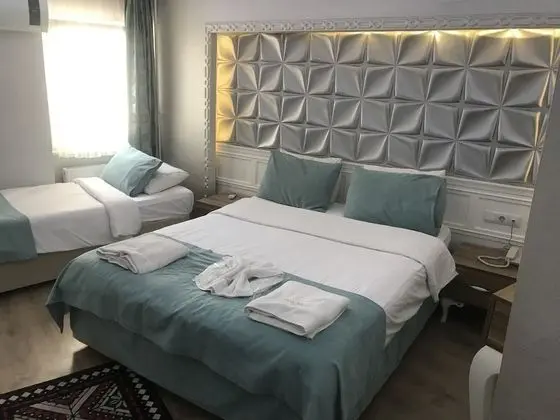 Üç Kişilik Oda