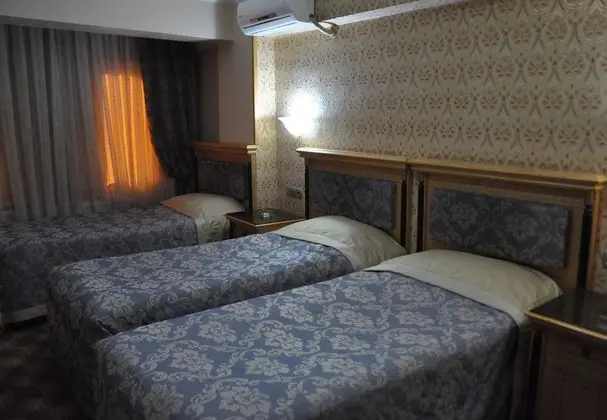 Üç Kişilik Oda