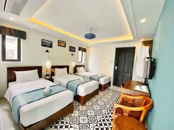 Deluxe Üç Kişilik Oda