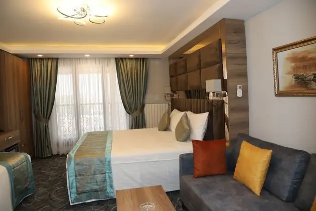 Deluxe Dört Kişilik Oda