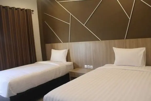 Deluxe Tek Büyük veya İki Ayrı Yataklı Oda