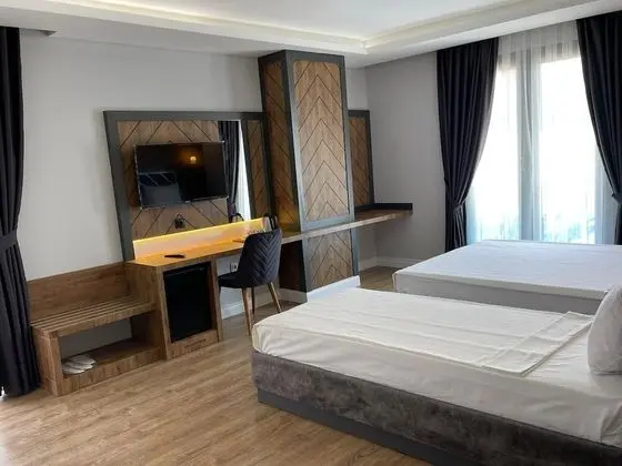 Deluxe Üç Kişilik Oda, Birden Çok Yatak